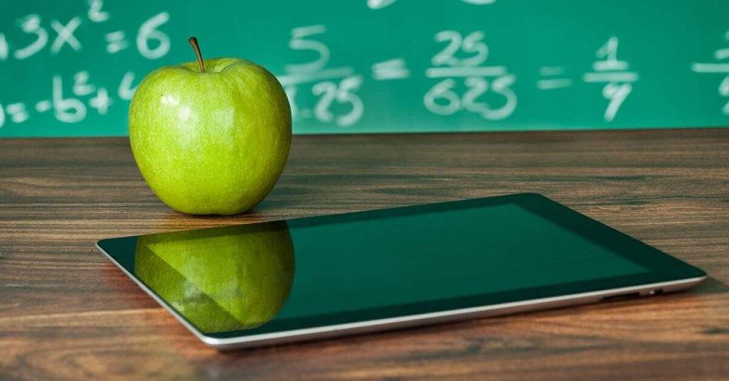 chalkboard with tablet