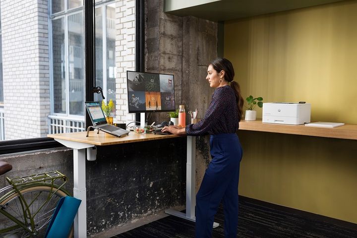 working from home at standing desk